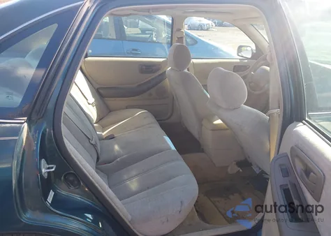 1999 Toyota Avalon Xl z USA, uszkodzony, nr VIN 4T1BF18B6XU343123